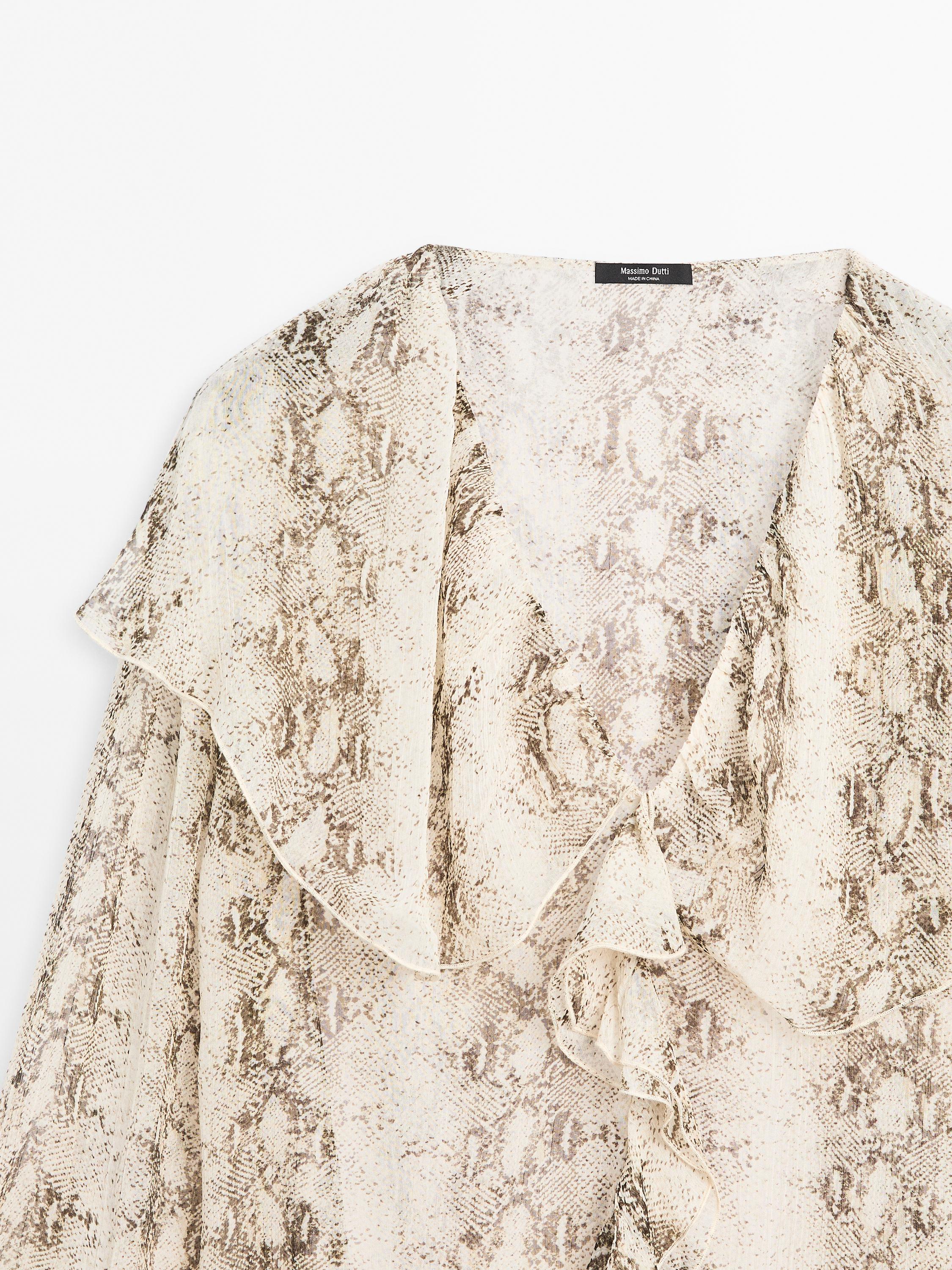 Snakeskin print blouse with ruffles
